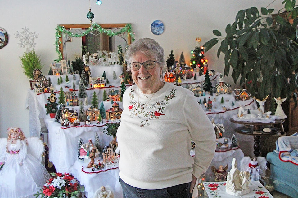 Linda Corr’s Christmas Village is made up of dozens of ornaments from model homes to trees, cars and even people. (Patrick Davies photo - 100 Mile Free Press)