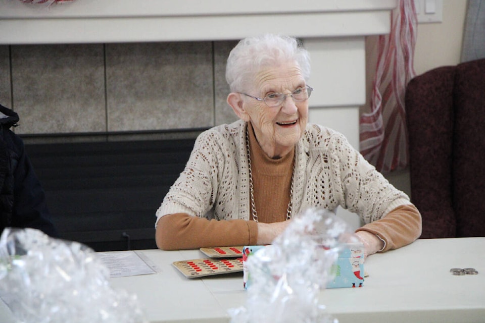 Blanche McAloney laughs during a game of bingo at Carefree Manor. (Patrick Davies photo - 100 Mile Free Press)