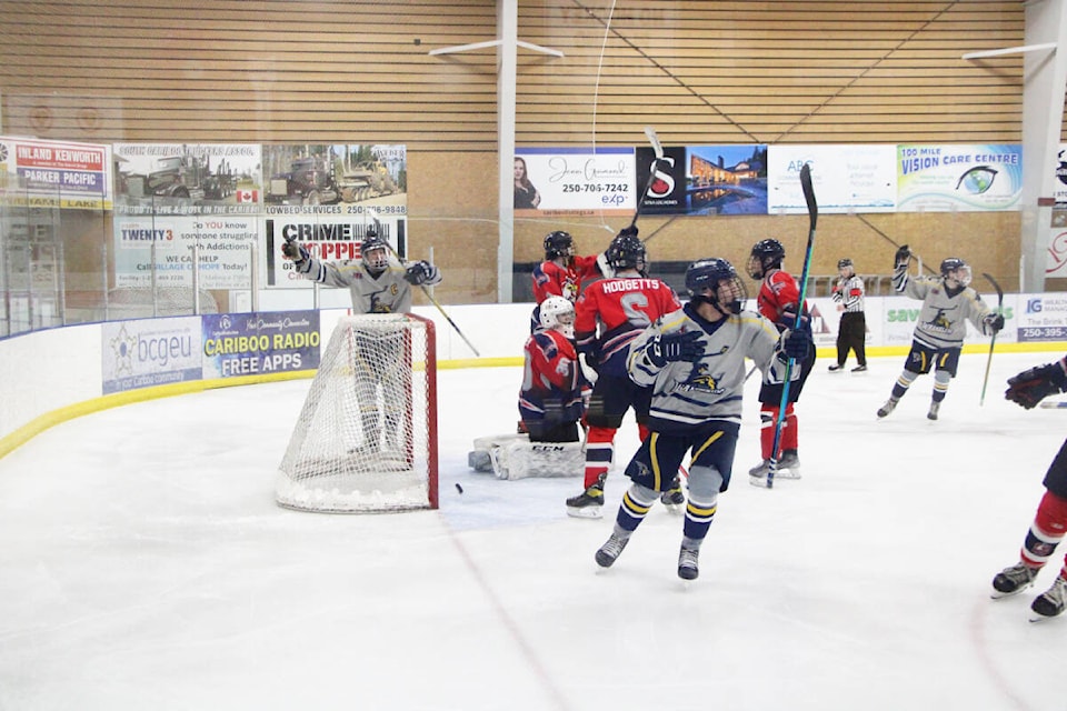 The 100 Mile House Wranglers celebrate as they score their second goal of the night against the Sicamous Eagles. (Patrick Davies photo - simplymastery)