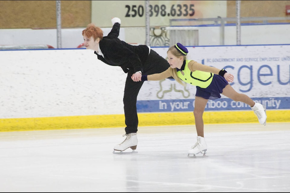 Alex Vallee, back, and Ella Frizzi strut their stuff on the ice at the year-end celebration for the 100 Mile Ice Skating Club. (Kelly Sinoski photo - simplymastery)