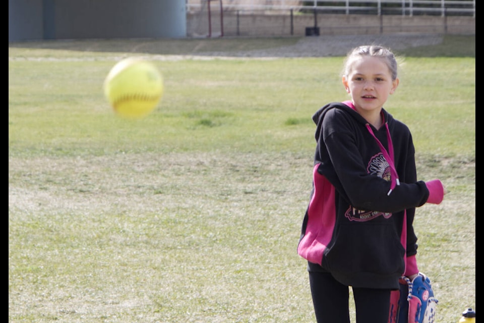 Rya Minnabarriett, of Cache Creek, participated in a pitching clinic hosted by Cache Creek Softball Association last weekend. The clinic, which also included batting, was run by Softball Canada instructor Jackie Desilets. (Kelly Sinoski photo - 100 Mile Free Press).