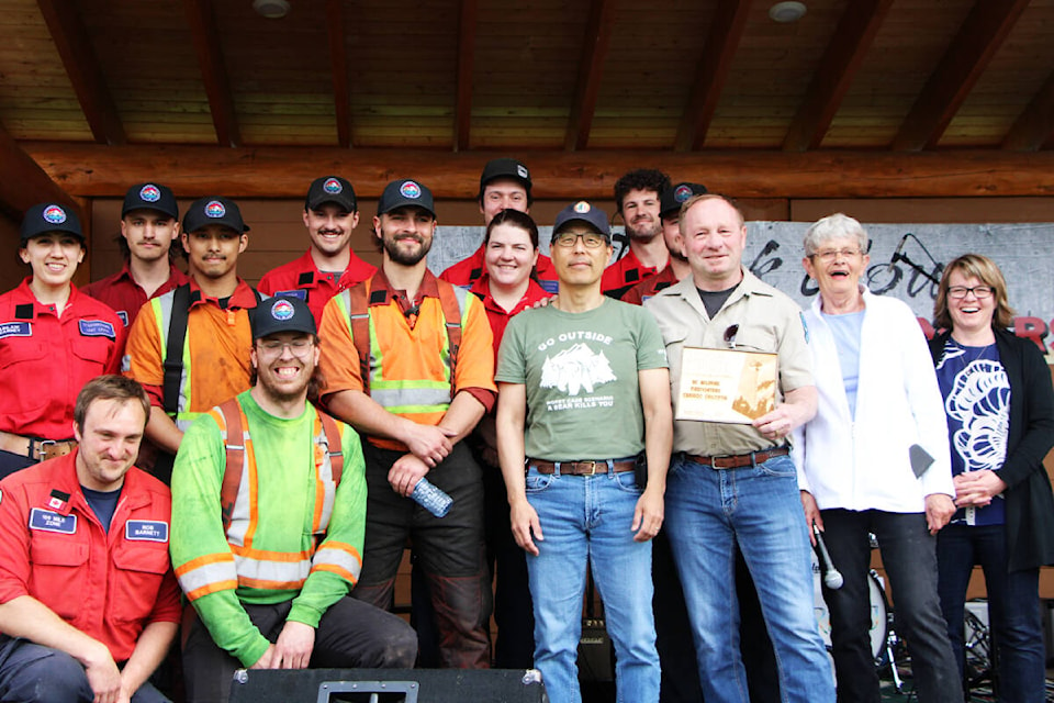 The CS Wildfire Service Storm Riders accept a Community Appreciation and Thank You Award at the Community Appreciation Day in Centennial Park. (Patrick Davies photo - 100 Mile Free Press)