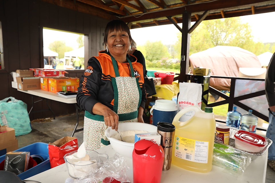 Nancy Lulua prepares for the bannock-making competition at the High Bar First Nation Aboriginal event on Tuesday, June 21. (Kelly Sinoski photo - 100 Mile Free Press).