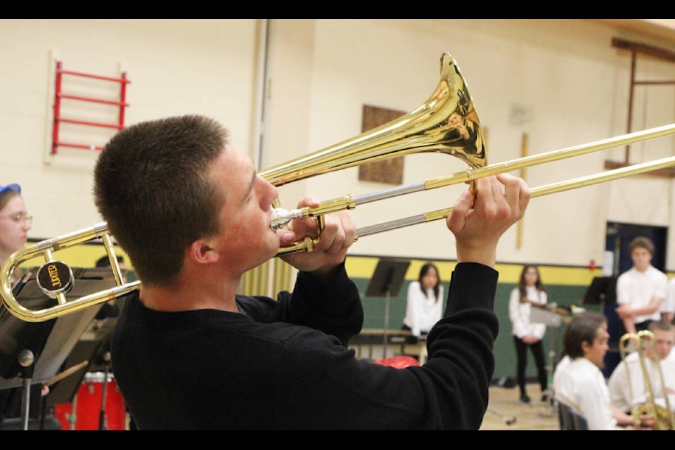 Reese Stobbart rocks a trombone solo while performing with Peter Skene Ogden Secondary School’s jazz band. (Patrick Davies photo - 100 Mile Free Press)