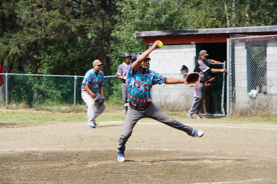 Bannock Slaps pitcher Shane Miller leaps up to make a pitch during the Steve Daniels Jr. Memorial Fastball Tournament last Saturday. (Patrick Davies photo - 100 MIle Free Press)