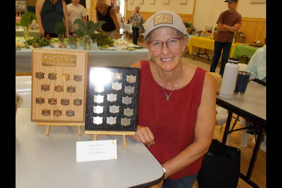 Bridge Lake Fair grand aggregate winner Barb Matfin, with plaques dating back to 2000. (Diana Forster photo)