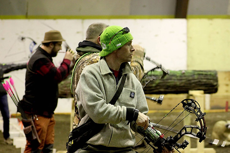 Cam Robb prepares to shoot at the Big Horn Archery’s Club’s indoor shoot at the Agriplex in 100 Mile House on March 17, 2019. Brendan Kyle Jure photo.