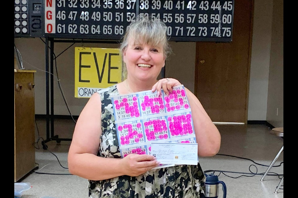 A very happy and excited Sandy Logan wins the $2600 progressive jackpot (Linda Barker photo).