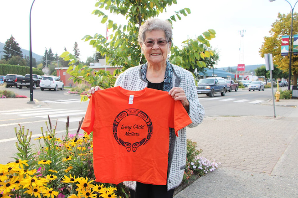 Elsie Urquhart marked Orange Shirt Day this year by running a contest for local students. The winner each received a custom orange shirt made by Urquhart. (Patrick Davies photo - 100 Mile Free Press)