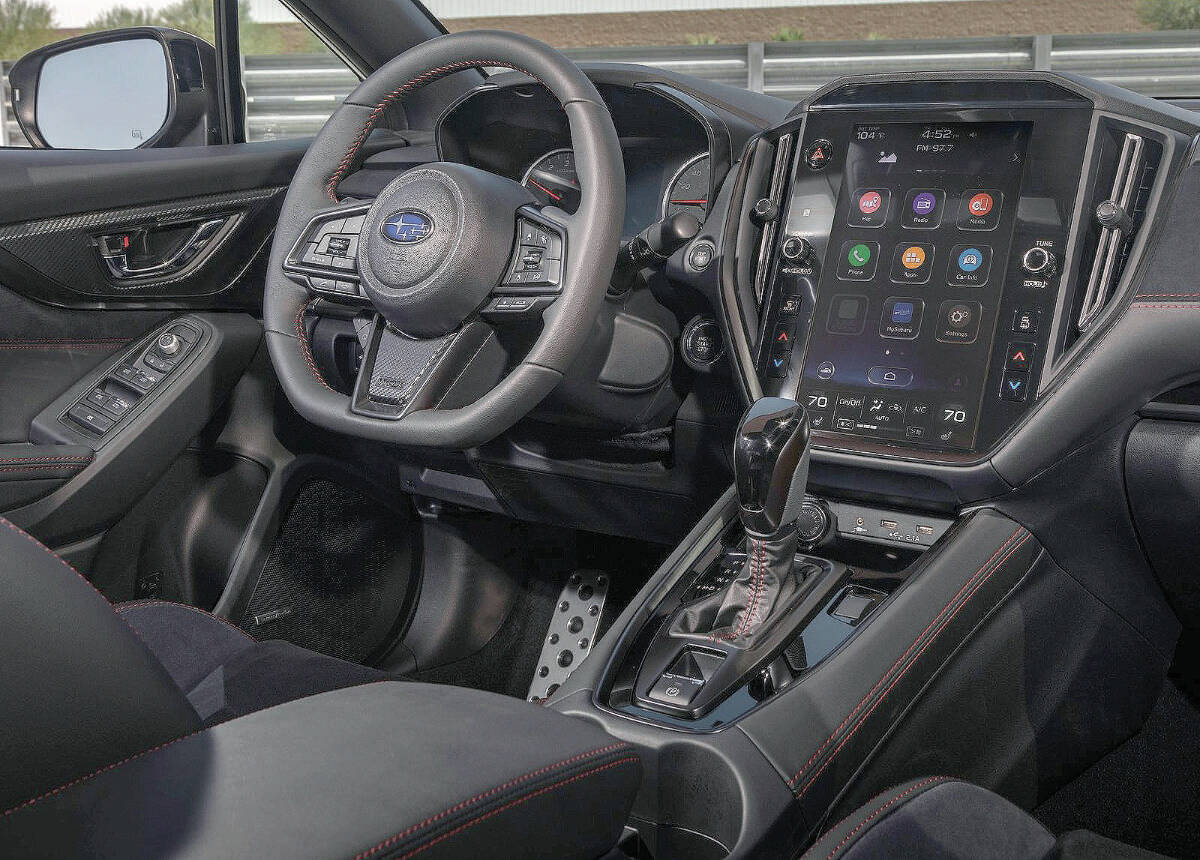 The 2022 WRX has a flat-bottom steering wheel and a 7.0-inch touch-screen (an 11.6-inch screen is optional) with standard Apple CarPlay and Android Auto. PHOTO: SUBARU