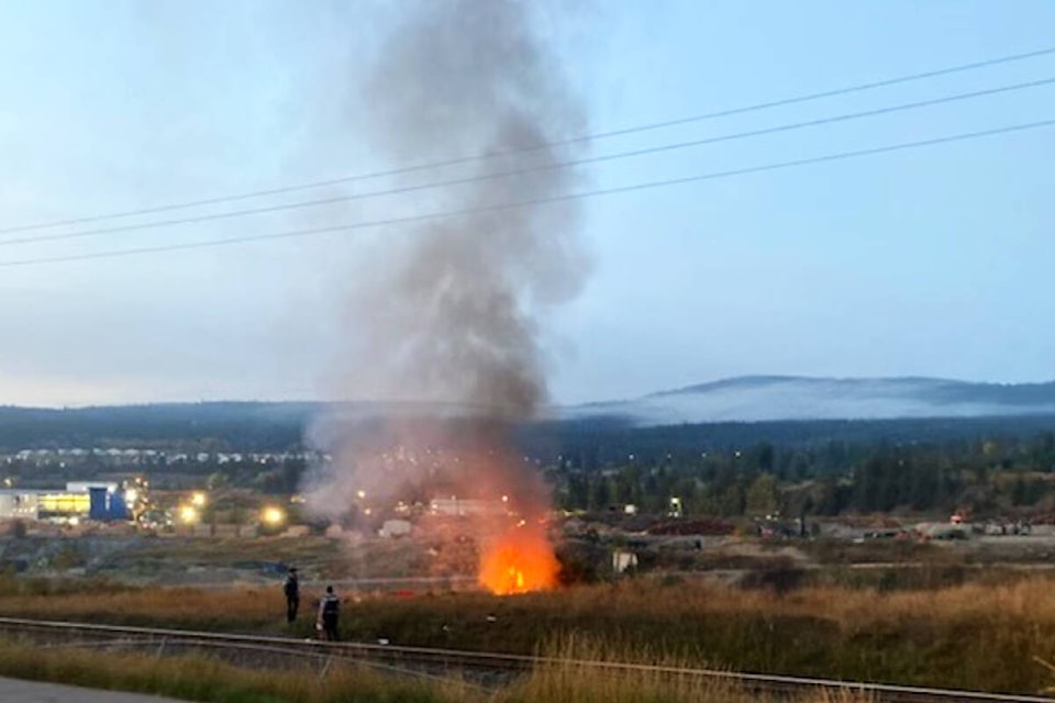 Williams Lake RCMP and Williams Lake Fire Department are on scene at a fire across the rail tracks and Mackenzie Avenue in Williams Lake Friday morning, Oct. 7. (Photo submitted)