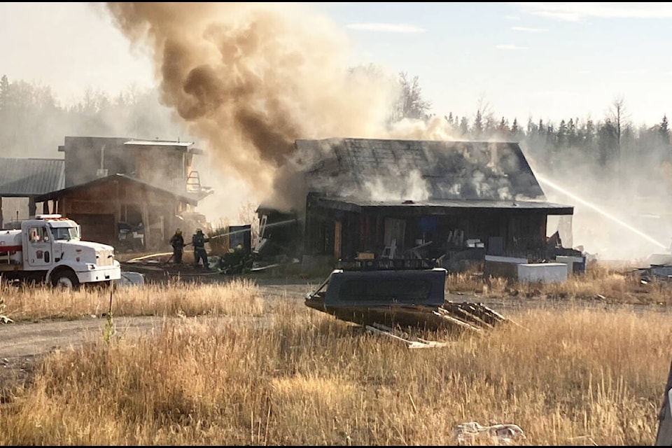 Lone Butte Fire Department and 100 Mile House Fire Rescue responded to a fire in Lone Butte Wednesday afternoon. (Fiona Grisswell photo - 100 Mile Free Press)