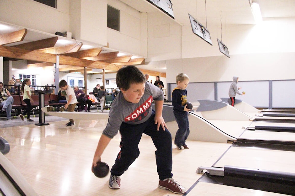 Beau Crompton and his brother Own bowl together at Big Country Lanes youth bowling league.(Patrick Davies photo - 100 Mile Free Press)