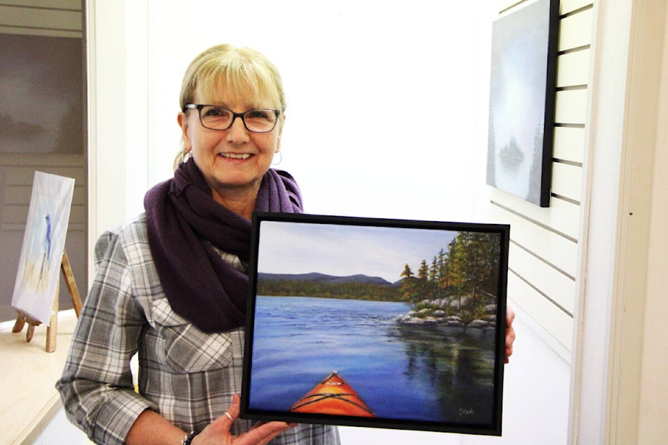 Bobbie Crane is trying her hand at landscapes this year with a new series of paintings named Inhale Exhale based on pictures she has taken while kayaking. (Patrick Davies photo - 100 Mile Free Press)