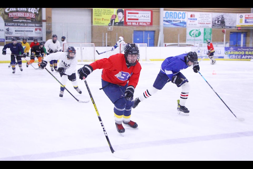 100 Mile Minor Hockey U15 players Sean Moore and Noah Bissat lead the pack during a practice drill. (Patrick Davies photo - 100 Mile Free Press)