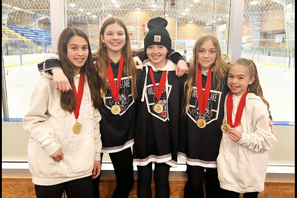 From left to right: Williams Lake U13 Timberwolves Maielle Briggs, Claire Johnson, Brynn Ferguson, Kaylee Pylarinos and Shia Briggs holding the gold medals they won at the 2023 Wickfest this month. (Fiona Grisswell photo - 100 Mile Free Press)