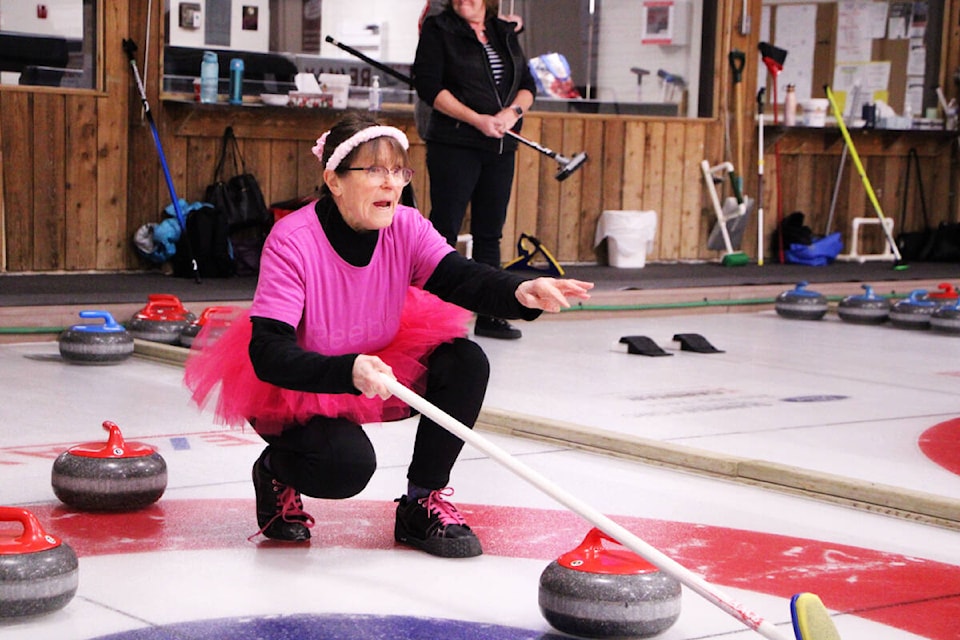 Christine Grenzer shouts at her sweepers during the Pink at the Rink bonspiel last weekend. (Patrick Davies photo - 100 Mile Free Press)