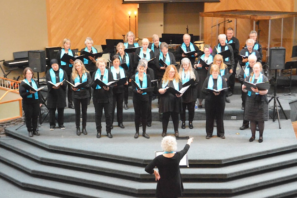 The Eclectica Choir from 100 Mile House performed at the Parade of Choirs With Friends 2023 in Williams Lake on Sunday, April 2. The choir joined four other groups to participate in the fundraiser for the Hough Memorial Society which raises money in Williams Lake for cancer detecting equipment at Cariboo Memorial Hospital.(Monica Lamb-Yorski photo - Williams Lake Tribune)