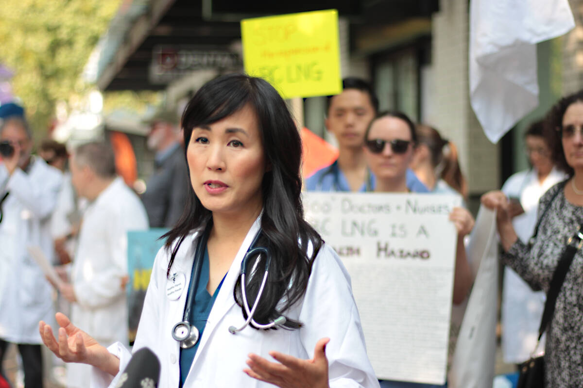Dr. Melissa Lem, a Vancouver physician and president of the Canadian Association of Physicians for the Environment, speaks outside Premier David Ebys Vancouver constituency office Thursday (Aug. 24). The association was calling on the province to put a moratorium on future LNG projects, citing the risks associated with climate change. (Lauren Collins)