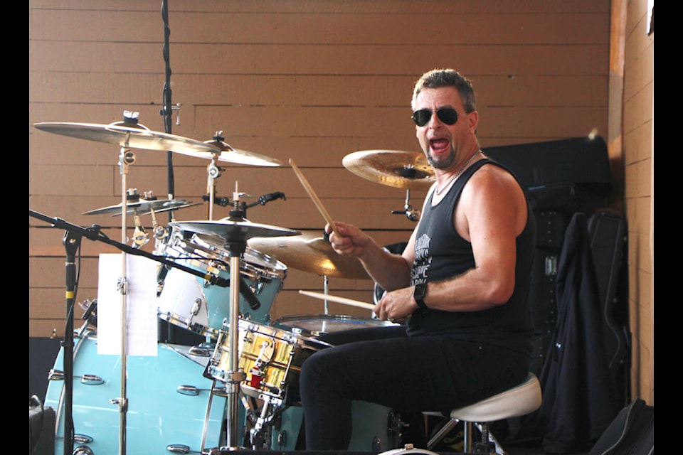 Prior Street Lush drummer Glenn Regnier rocks out in Centennial Park on Aug. 25. (Patrick Davies photo - simplymastery)