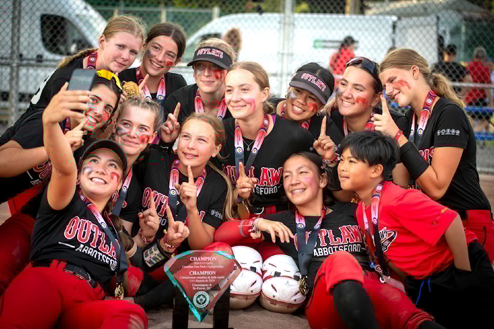 The Abbotsford Outlaws celebrate a national title after a 1-0 extra innings win over Waterloo on Sunday (Aug. 18). 