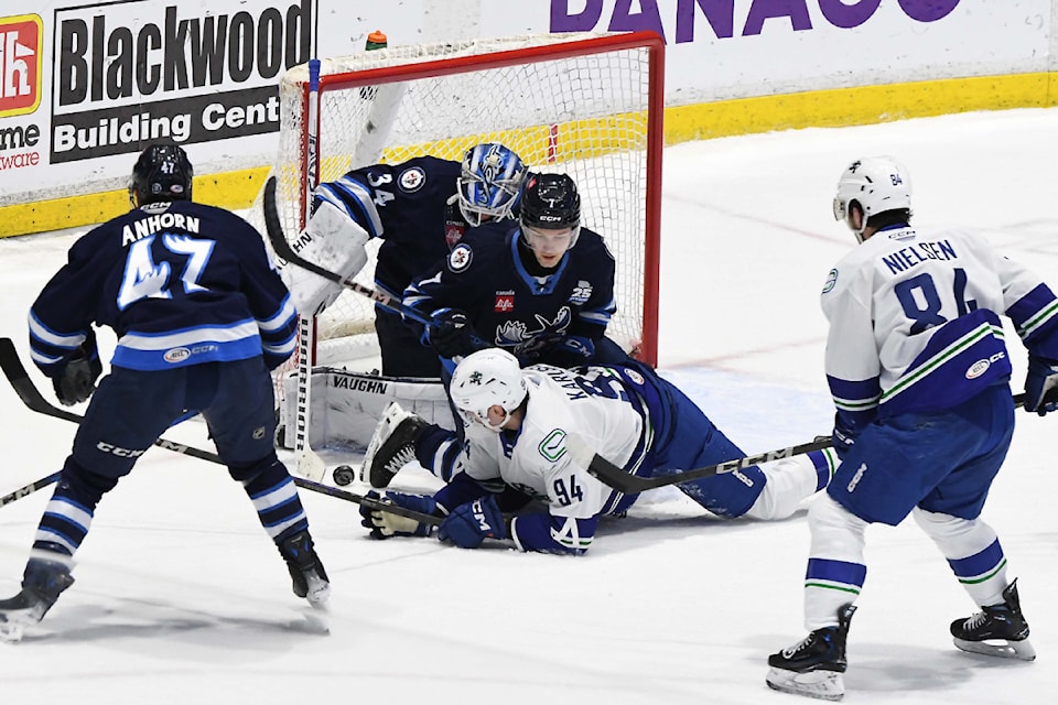 Linus Karlsson crashes the Moose net on Saturday (Dec. 14). 