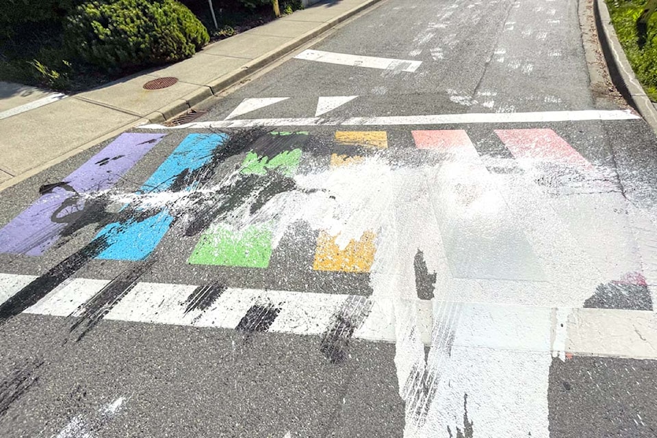 Black and white paint was spilled across the rainbow crosswalk at UFV in Abbotsford. The vandalism was discovered on Monday morning (July 8).