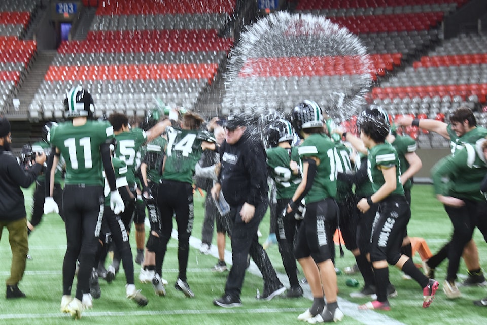 Bateman players celebrate the win.