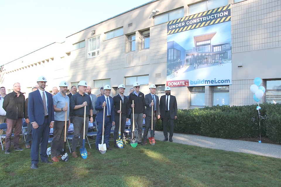 Celebrating the ground-breaking at MEI Secondary on Tuesday morning (Sept. 24) are (from left) Peter Hay, Walter Schroeder, Quintin Van Dyk, Mark Thiessen, Kevin Fedrau, Michael Redekop, Mayor Ross Siemens and Vijay Manuel. 