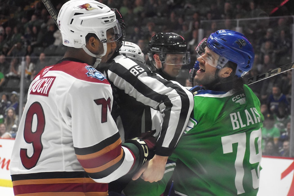 Sammy Blais and Montana Onyebuchi chat following a scrum.