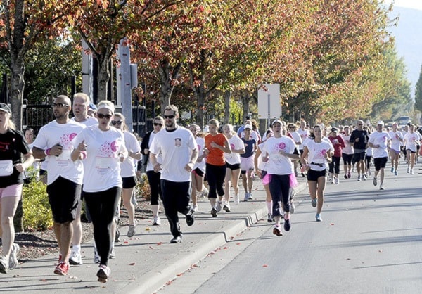 CIBC Run for Cure makes its way westbound on Maclure Rd. John Morrow