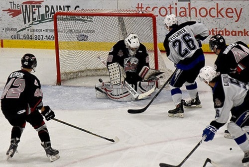 Pilots players attack the net during PJHL action in Abbotsford on Friday.