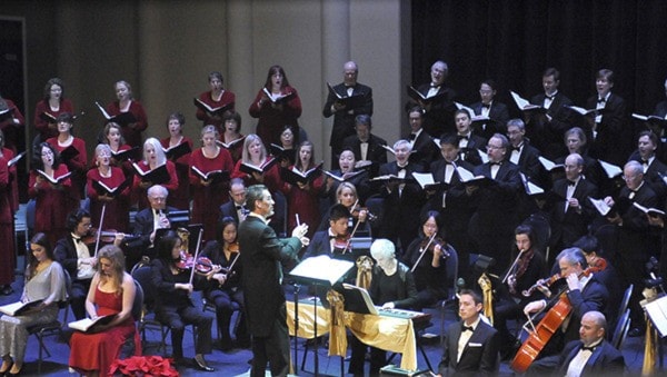 Calvin Dyck conducts orchestra and Vancouver Bach Choir. John Morrow