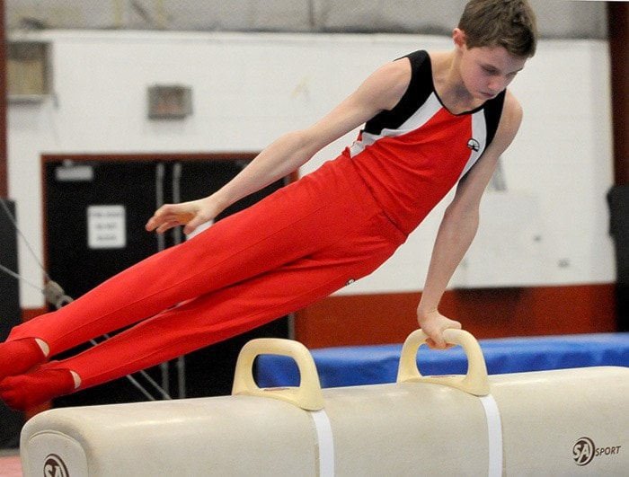 Dawson Friesen on pommel horse. John Morrow