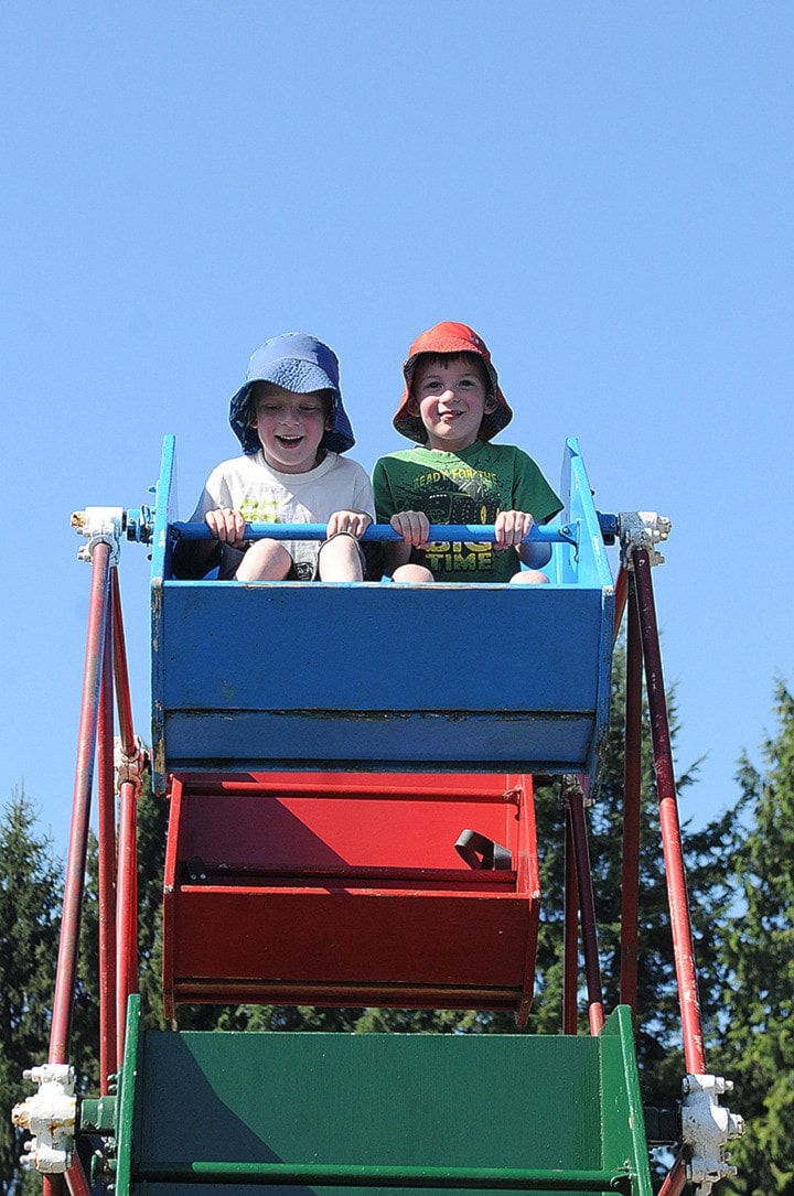 Josh and Greg enjoy ferris Wheel at Mt. Lehman Fall Fair. John Morrow