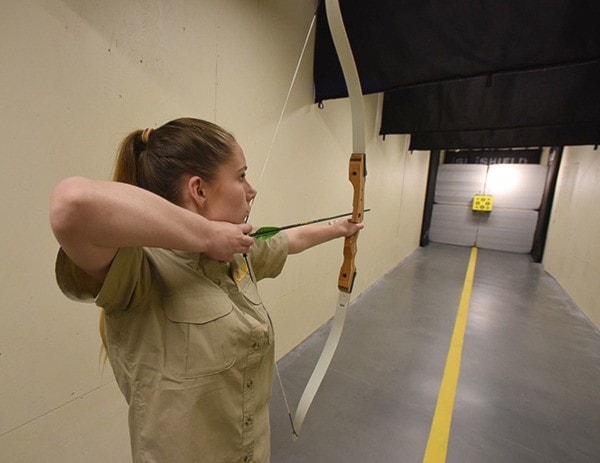 Victoria O'Brien demonstrates her skill in the archery range at Cabela's