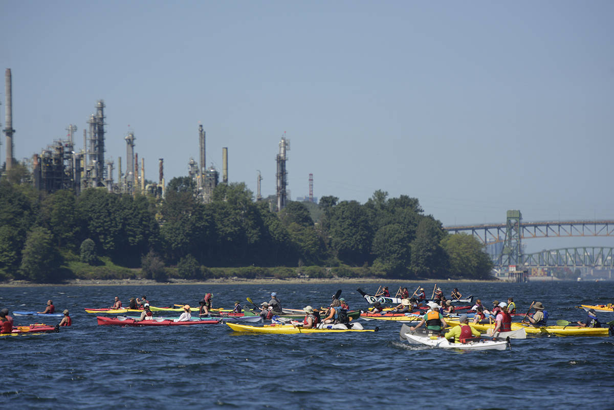 Activists protest outside Kinder terminal in kayaks, canoes