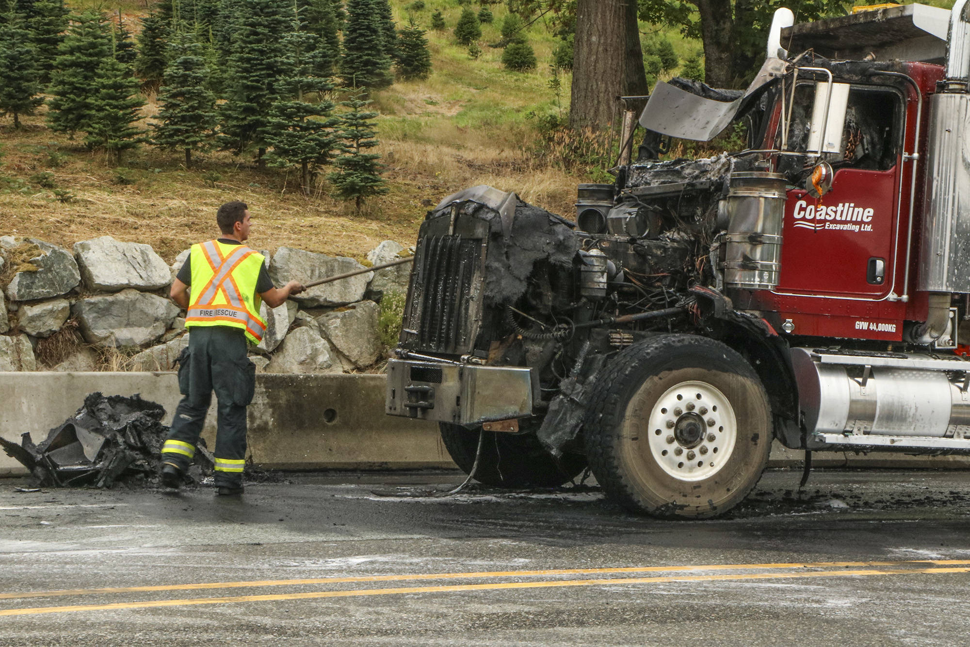 12967672_web1_180801-ABB-DumpTruckFire