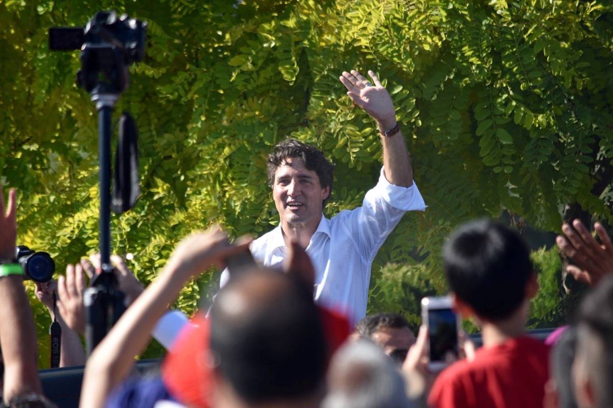 13020758_web1_180805-NDR-M-Trudeau-in-Delta-waving-bye