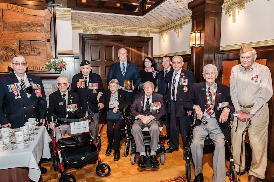 17162360_web1_Horgan-D-Day-vets-may27.19