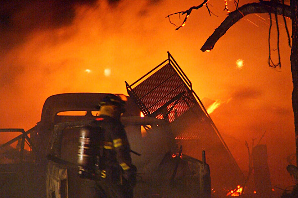 20936231_web1_200314-ABB-wind-fire-garage-fire_1