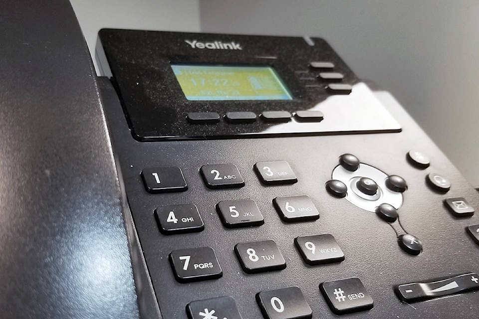 21039779_web1_200321-LAT-phone-scam.jpg;w=960