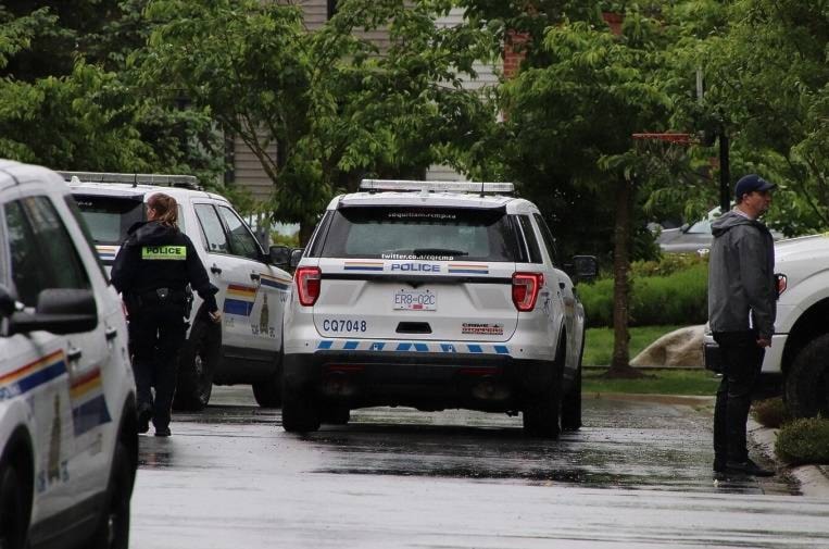 RCMP were on scene in Port Coquitlam on Saturday, May 18, 2020, after a baby was found abandoned. (Shane MacKichan/Special to Black Press Media)