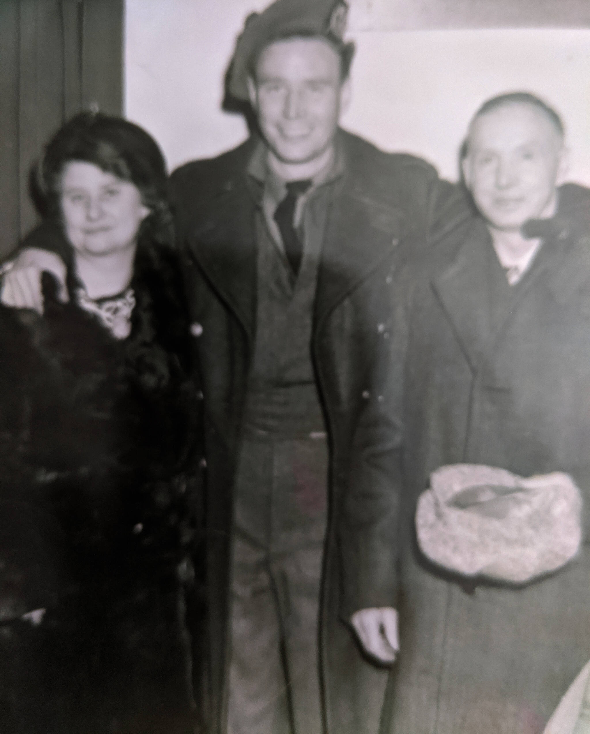 Bert Moody with his parents the day he came home from Europe.