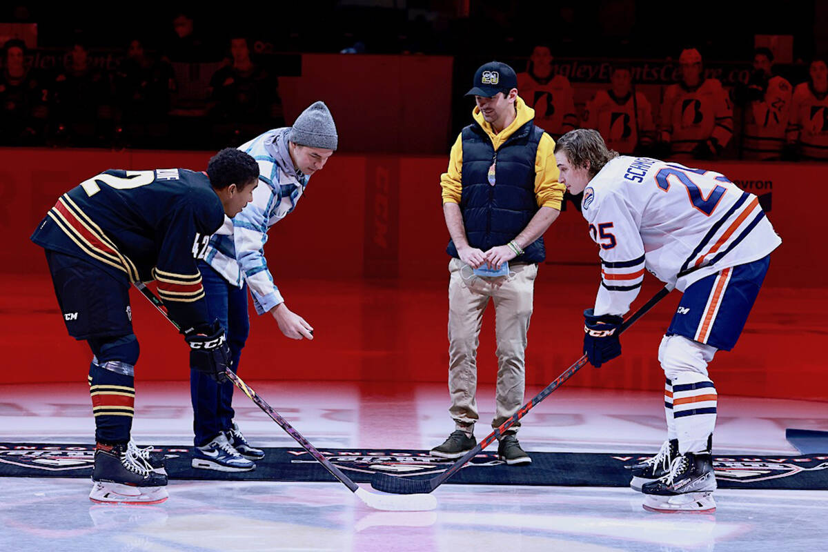 Layne Matechuk, #28 of the Humboldt Broncos, joined the Giants for a special ceremonial puck drop Saturday, Nov. 14. Layne, a survivor of the April 6, 2018 bus crash, is undergoing therapy in Surrey and hopes to become a fitness trainer. (Rob Wilton/Special to Langley Advance Times)