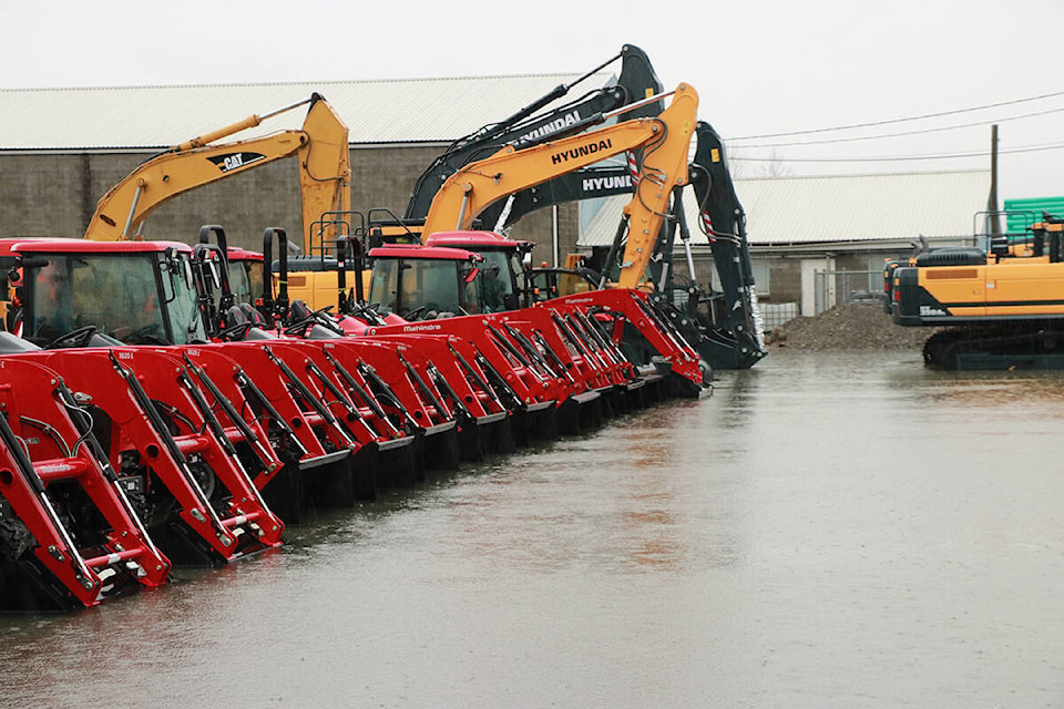 Tractors at a Huntingdon business flooded by the rainstorm. Andy Holota / Black Press Media photo.