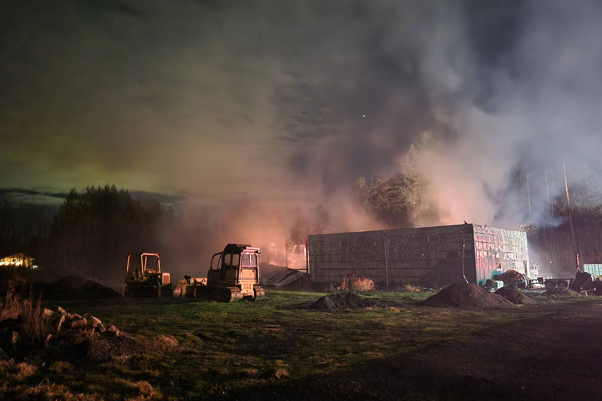 A barn fire closed 264th St. near 58th Ave. in Aldergrove Monday night, Feb. 7. (Dan Ferguson/Langley Advance Times)