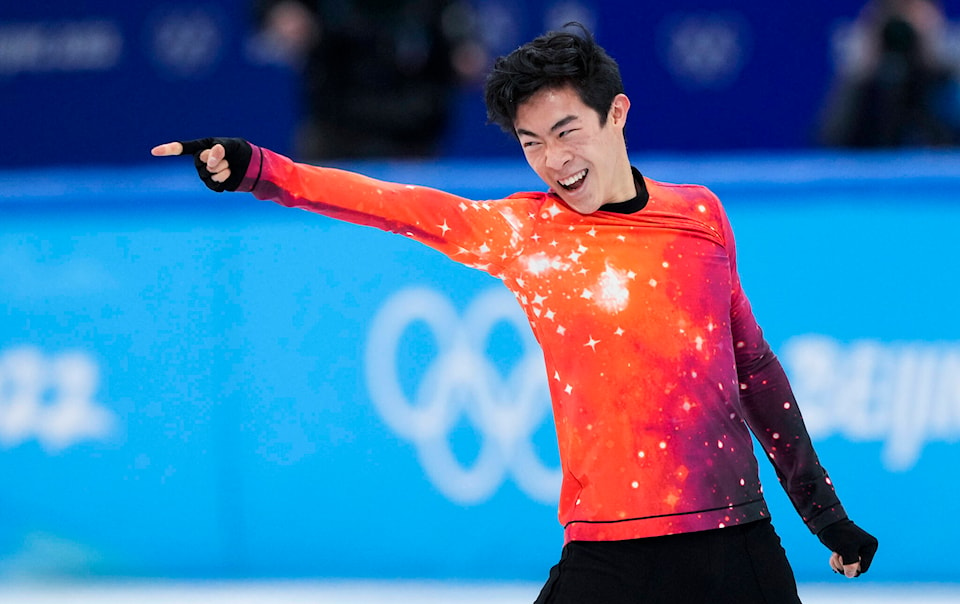 28120595_web1_220210-CPW-Chen-skating-gold-Chen_1