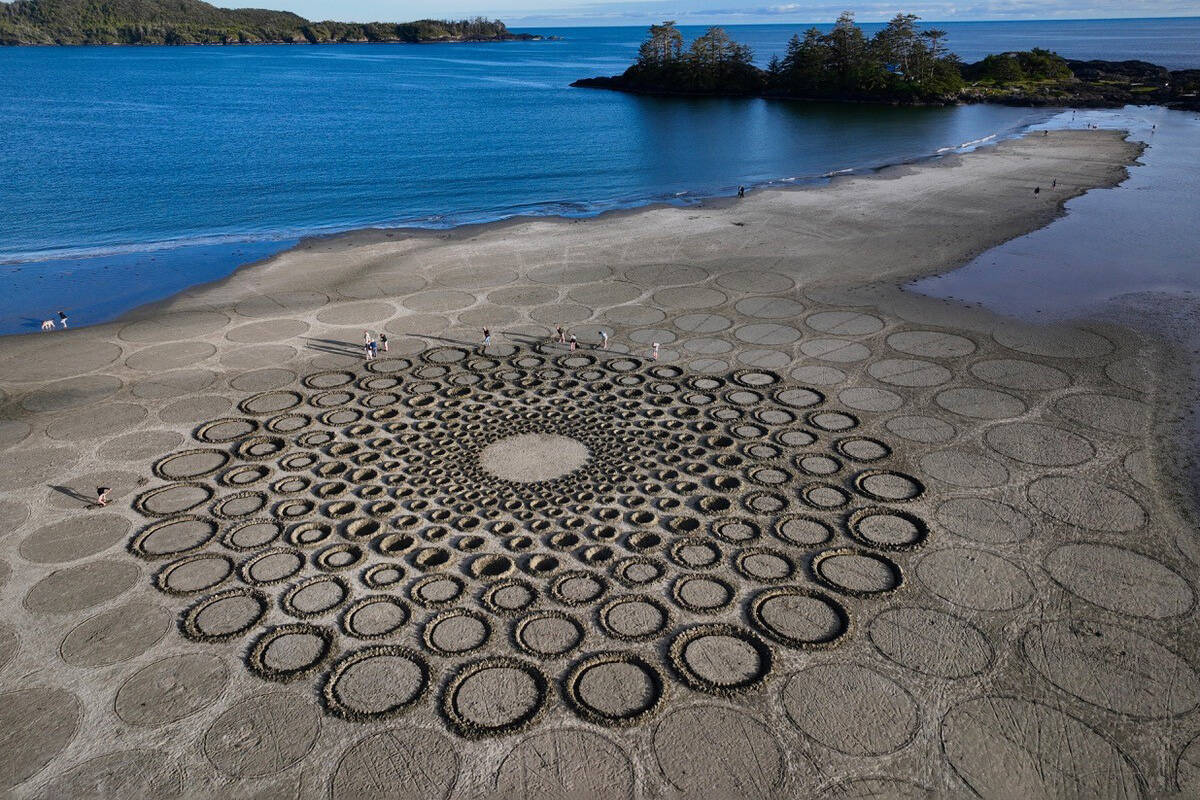 Tides overtake sprawling sand sculpture mural on B.C. beach, just as