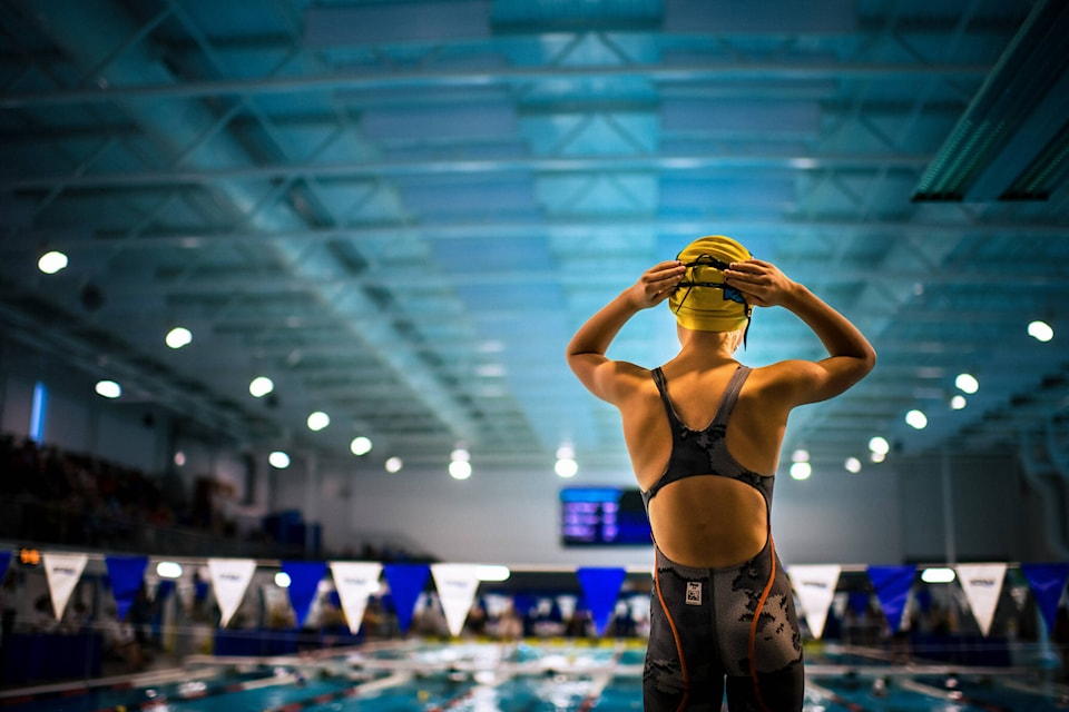 Allison McCormick moments before winning gold in the Division 1 girls 50-meter butterfly. Copper Wire Images